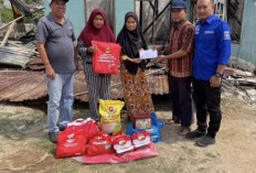 Dinsos Salurkan Bantuan Bupati Muba untuk Korban Kebakaran di Bayung Lencir