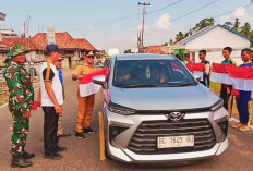 Rangkaian HUT RI Ke-79, Forkopimcam Sanga Desa Bagikan 1000 Bendera Merah Putih 