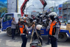 Tegas! Petugas Gabungan Tertibkan Kendaraan yang Parkir Sembarangan di Kota Palembang