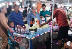 Diminati Pengunjung, Penjual Chiki Ngebul di Pasar Malam Desa Ngulak III Raup Untung