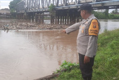 Debit Sungai Ogan Naik, Polsek Muara Kuang Imbau Warga Waspada