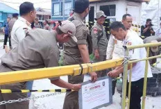Nunggak Pajak, Lahan Parkir Komplek Ruko Rajawali Disegel, Segini Tunggak Pajaknya 