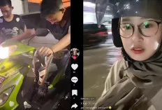 Wanita Berhijab Ini Curhat, Motornya Mogok Saat Terjebak Banjir