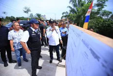 Tingkatkan Konektivitas OKU, Herman Deru Resmikan Jembatan Air Serami dan Salurkan Bantuan Pangan