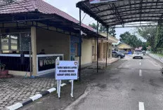 Depan Pintu Penjagaan Polres Ogan Ilir Dipasang Papan Himbauan, Tamu Wajib Lapor dan Buka Kaca Mobil