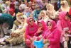 Peringati Hari Kebaya Nasional 2026, Sumsel Cetak Rekor Muri Dunia Lewat Parade Songket di Jembatan Ampera