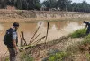 Mayat Tanpa Identitas Ngapung di Parit Primer Desa Bandar Tenggulang Babat Supat